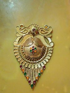 Exquisite Gold Pendant with Gemstones