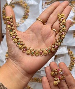 Exquisite Gold Necklace and Earring Set