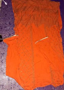 Vibrant Orange kurta with Gold Accents