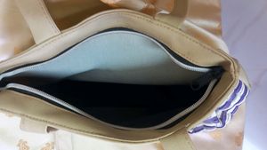 Beige Handbag With Purple And White Stripes