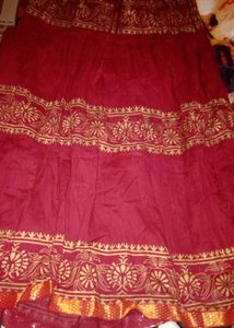 Maroon tiered ethnic skirt and black top