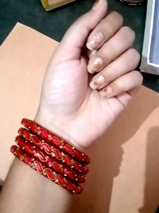 Set of Red Bangles with Gold Detail
