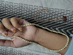 Elegant Pearl Necklace and Butterfly Pendant