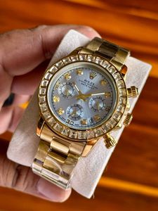 Gold Rolex Daytona Watch with Diamonds