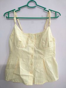 Butter yellow peplum top