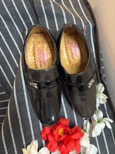 Black Patent Loafers unused. Fits from 6 mont