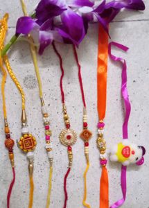 7 Assorted Rakhi Bracelets with Ornate Designs