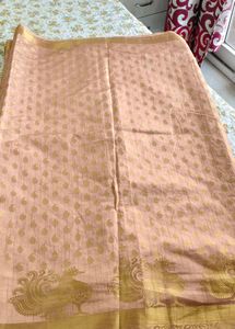 jari woven shiney chiku colour saree
