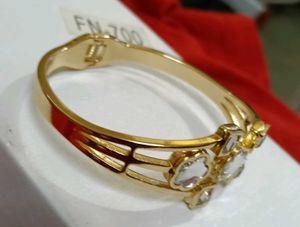 Elegant Gold Tone Bracelet with Crystals