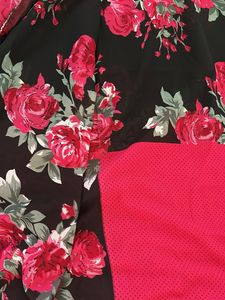 Elegant Black Saree with Pink Roses