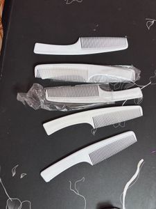 Set of 5 White Combs unused