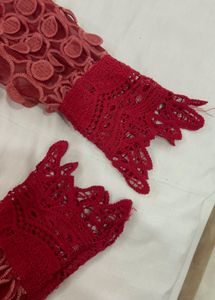 Chic Red Ribbed Knit Top with Lace Sleeves