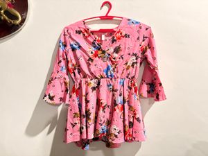 pink peplum top