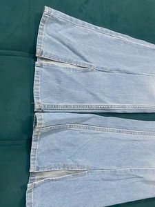 Light Wash Flared Jeans with Side Slits
