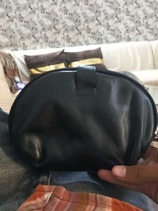 Chic Black and Teal Pouch with Flower Detail