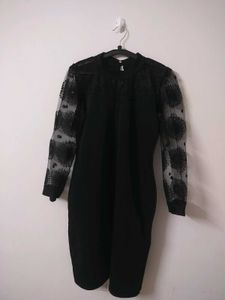 Elegant Black Dress with Sheer Embellished Sleeves