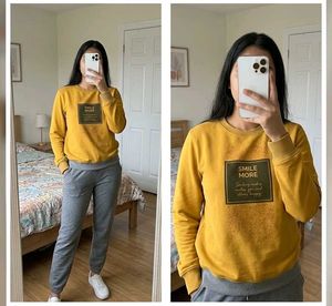 yellow sweatshirt