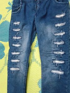 Ripped Blue Denim Jeans