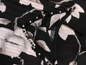 Elegant Black Floral dress with Embellishments