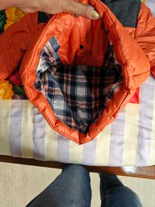 Orange Puffer Jacket with Grey Hood
