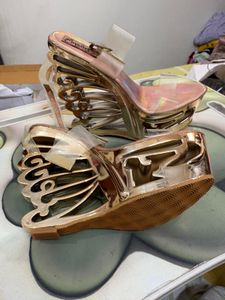 Stunning Gold Sculptural Wedge Heels