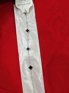 Silver Bracelet with Clover Charms