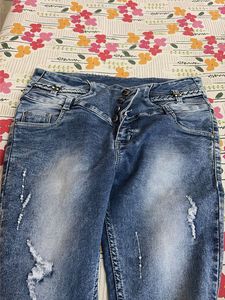 Distressed Blue Denim Jeans