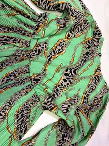 Green Cheetah Print peplum top fits S-M