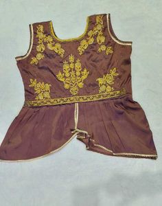 Embroidered Peplum Top