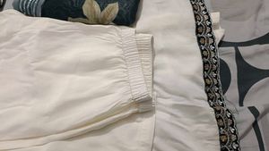 Elegant White Kurta with Embroidered Neckline