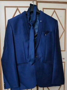 Men's Blue Suit with Tie and Pocket Square