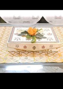 13. Decorative Gift Box with Floral Accent