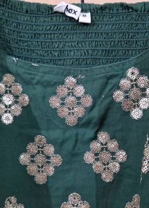 Green Embroidered Maxi Dress with golden jacket