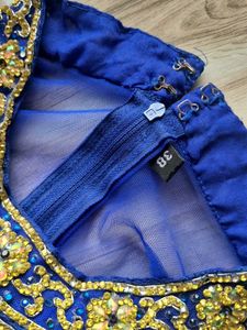 Elegant Royal Blue Gown with Gold Embellishments