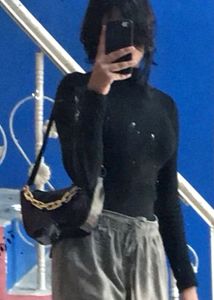 Chic Black Ribbed Turtleneck Top