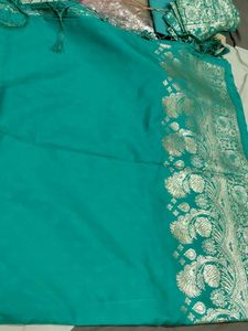 Elegant Teal Saree with Gold Embroidery