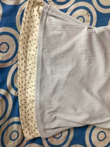 Faded light blue Ribbed Henley Top with Floral Lay