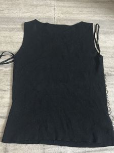 Black Sleeveless Top with Ring Embellishments