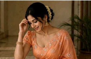 Elegant Peach Embroidered Saree