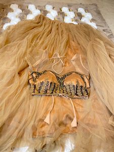 Coral fringes top lehenga set