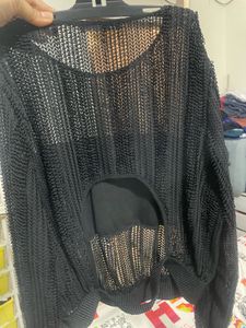 Zara black netted blouse with a bask lining