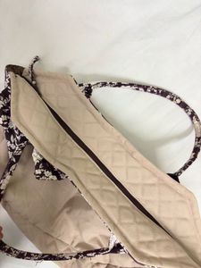 Chic Tote Bag with Floral Accent