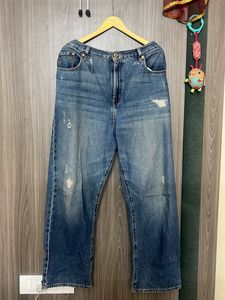 Distressed Blue Denim Jeans