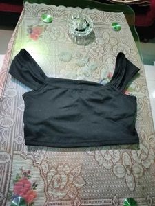 A stylish casual black sleeveless crop top