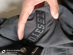 brand name is DIESEL OG Men's Hooded Parka Jacket