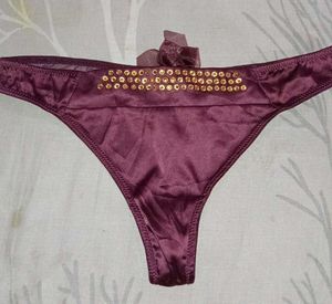 Elegant Thong with Sequins and Bow Detail