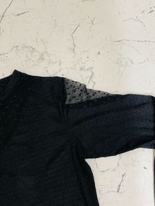Sheer Black Top and jeggs combo