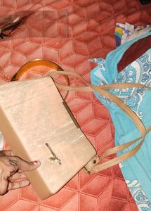 Elegant Clutch Bag with Gold Accents