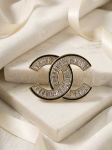 Elegant CC Brooch with Crystals
