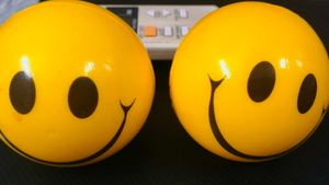 Set of 2 Yellow Smiley Stress Balls